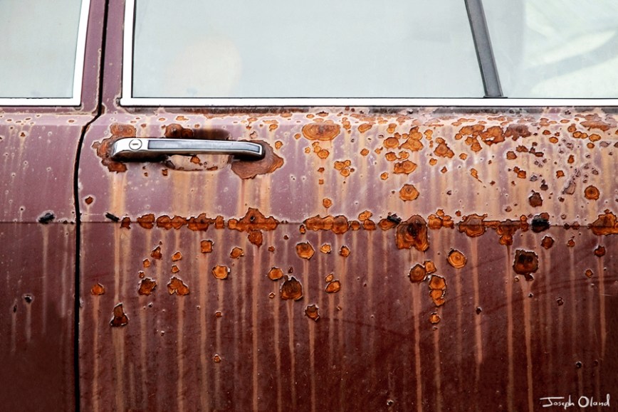 rusted-carpost
